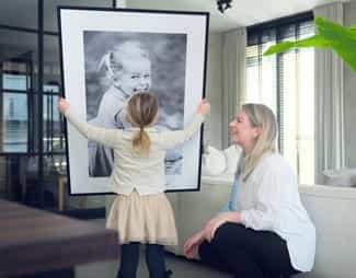 Mother and daughter with Frame